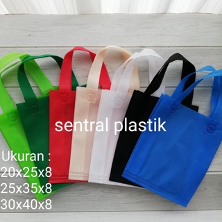 

Tas Kain Spunbond Tas Berkat Hajatan Goodie Bag Lipat Samping Spondbond Souvenir Roti
