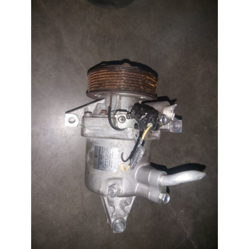 Kompresor ac grand livina 1.5