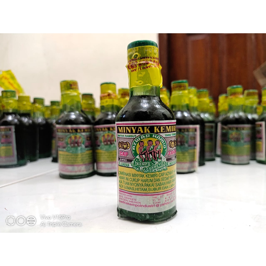 minyak kemiri asli cap 3 anak produksi bukit tinggi / minyak rambut kemiri asli