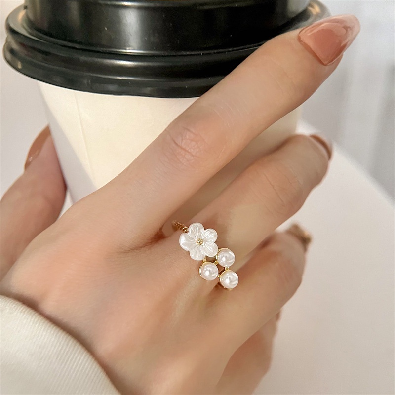 Cincin Model Terbuka Desain Bunga Aksen Mutiara Bahan Zirkon Gaya Korea Untuk Wanita