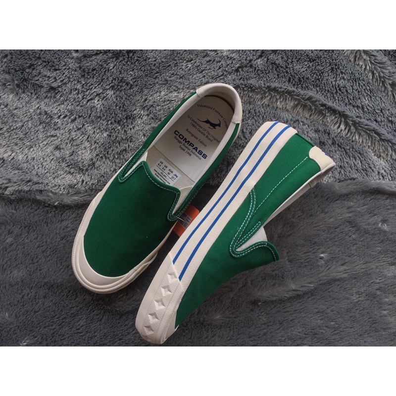 Compass slip on green