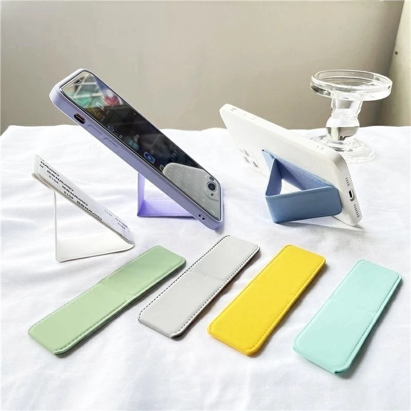 Hot Sale/Universal Warna Solid Dapat Dilipat Desktop Phone Holder/Gelang PU Kreatif Pegangan Jari Stand Ponsel/Bracket Portabel Kompatibel Dengan Semua Ponsel
