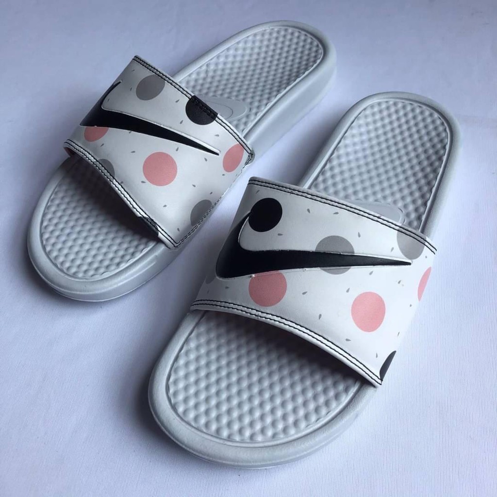 all white nike benassi slides