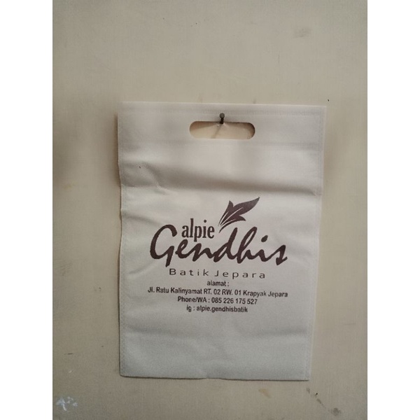TAS SPUNBOND OVAL CUSTOM SABLON 30X40 TAS PROMOSI TOKO TAHLIL WEDYNG  PROMOSI TOKO HP