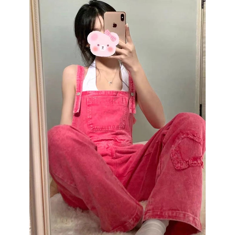 Musim panas baru overall denim robek merah muda versi Korea wanita dari desain jaring merah yang ter