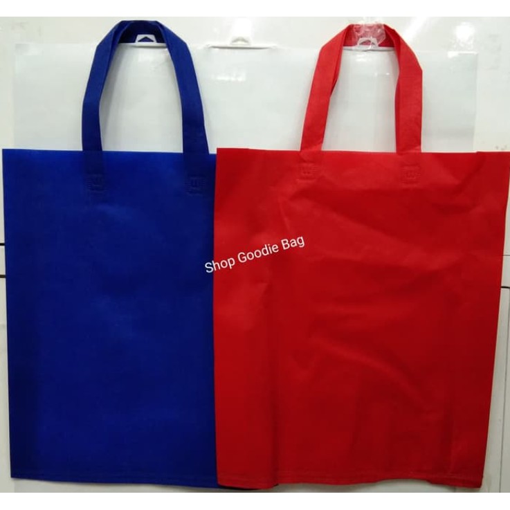 

Tas Spunbond Handle uk 38x45x8 cm / Goodie Bag / Tas Kain Polos