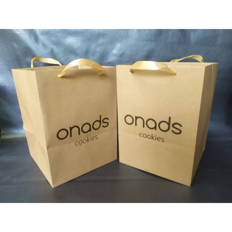 

PAPERBAG KRAFT COKLAT SIZE DAN DESIGN CUSTOM,