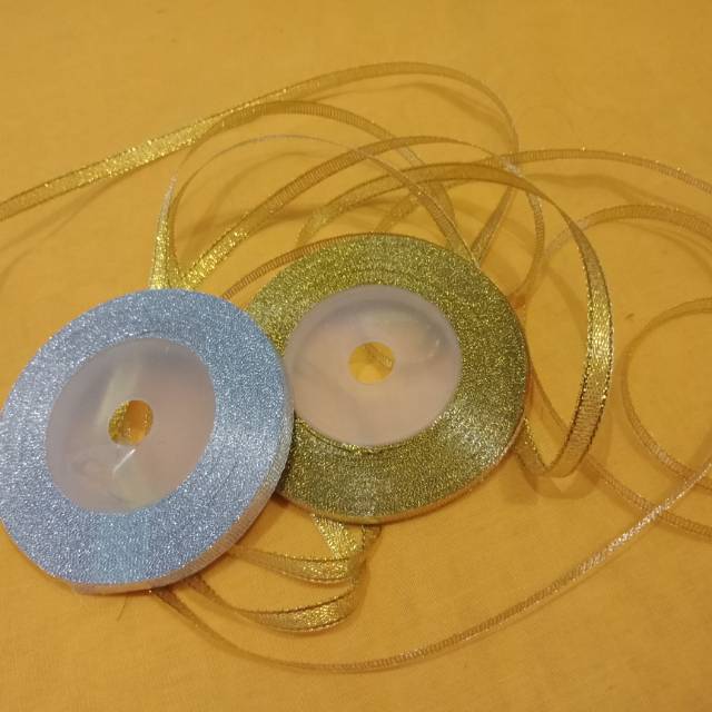 

Pita motif emas dan silver