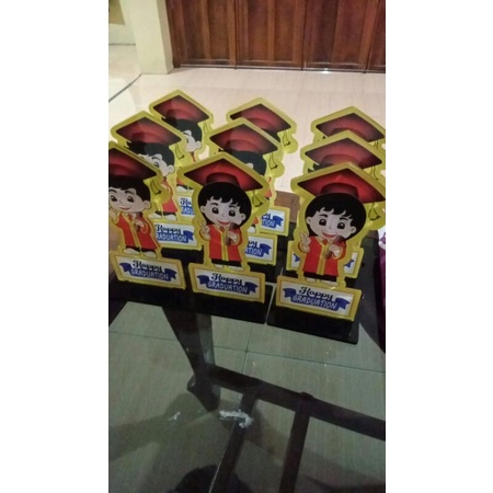 VANDEL BONEKA WISUDA