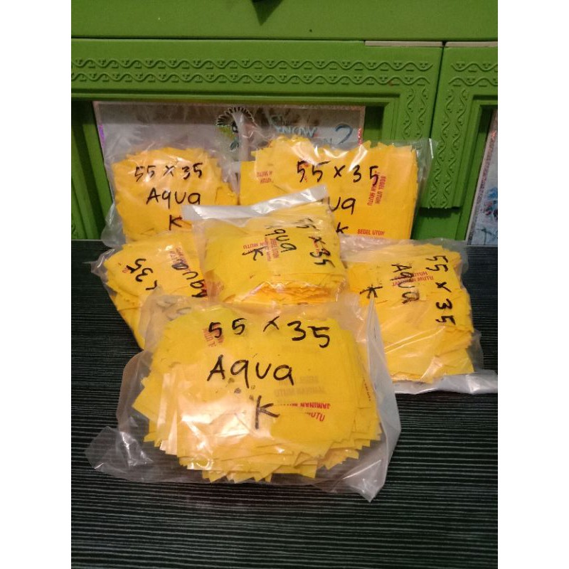 Segel Plastik Tutup Botol Aqua 55 X 35 kuning