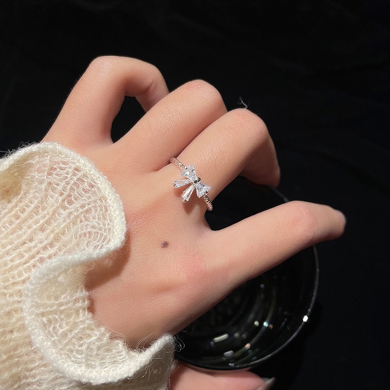 Cincin Model Terbuka Bahan 925 Silver Desain Pita Hias Kristalberlian Imitasi Adjustable Untuk Wanita