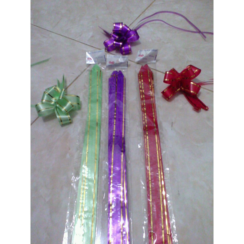 

Pita tarik list emas pita serut langsung jadi pita kado pita souvenir pita parcel pita parsel