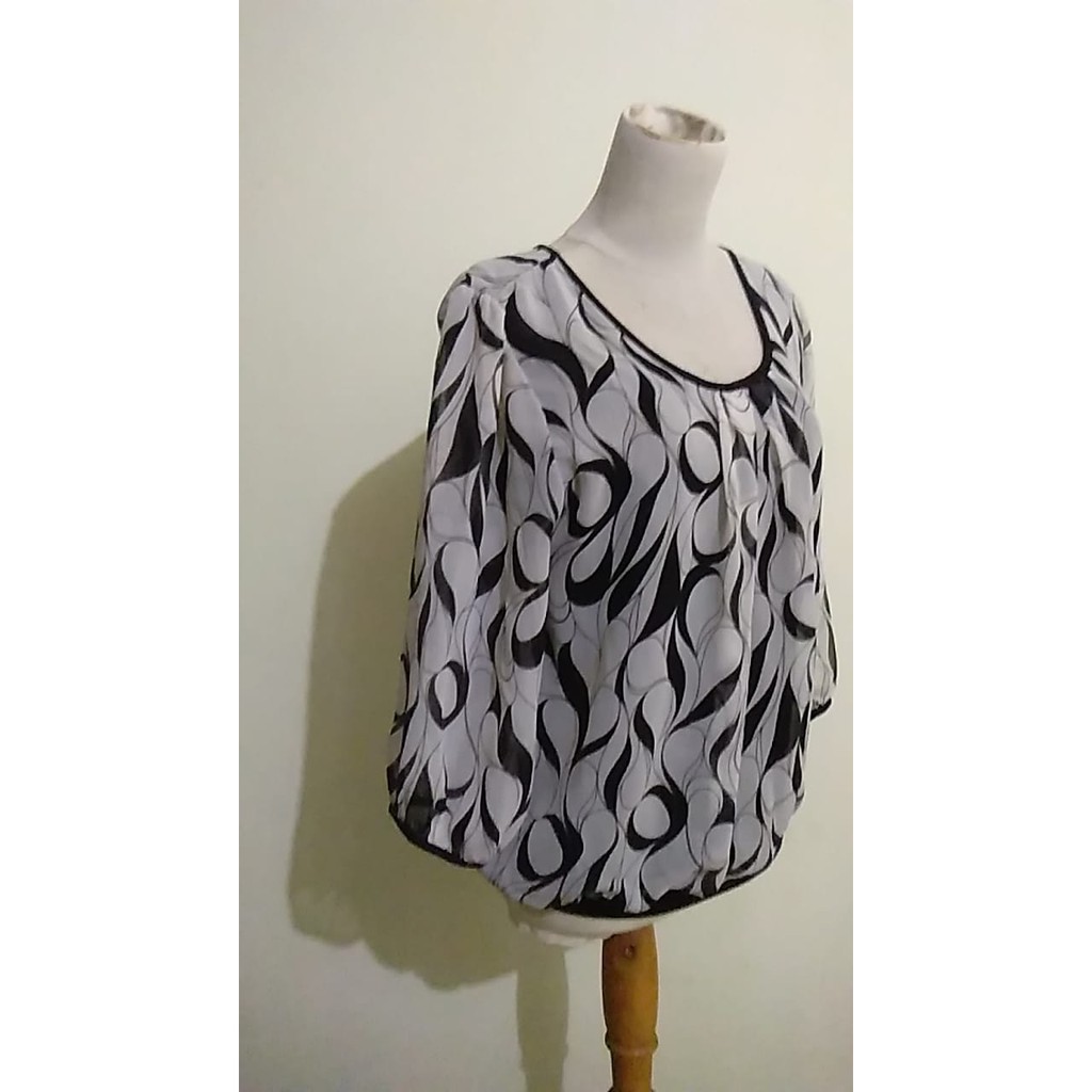 blouse kembang kembang