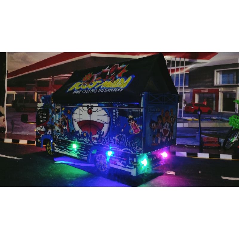 miniatur truk oleng Doraemon ukuran panjang 42cm full lampu bonus terpl