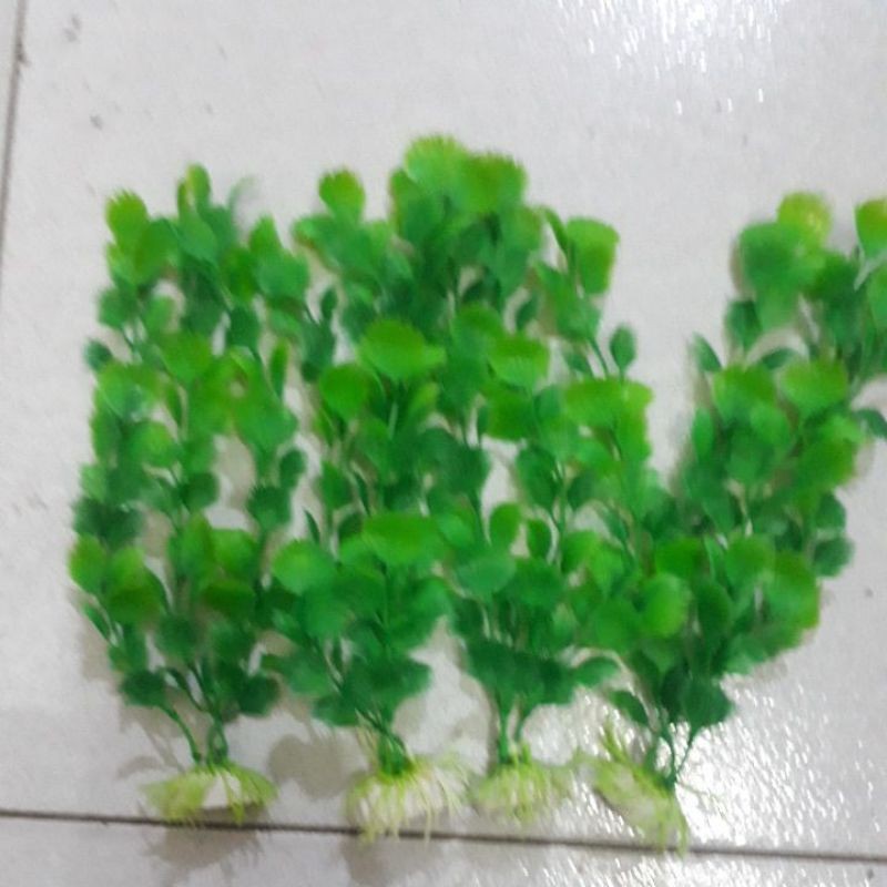Hiasan daun plastik