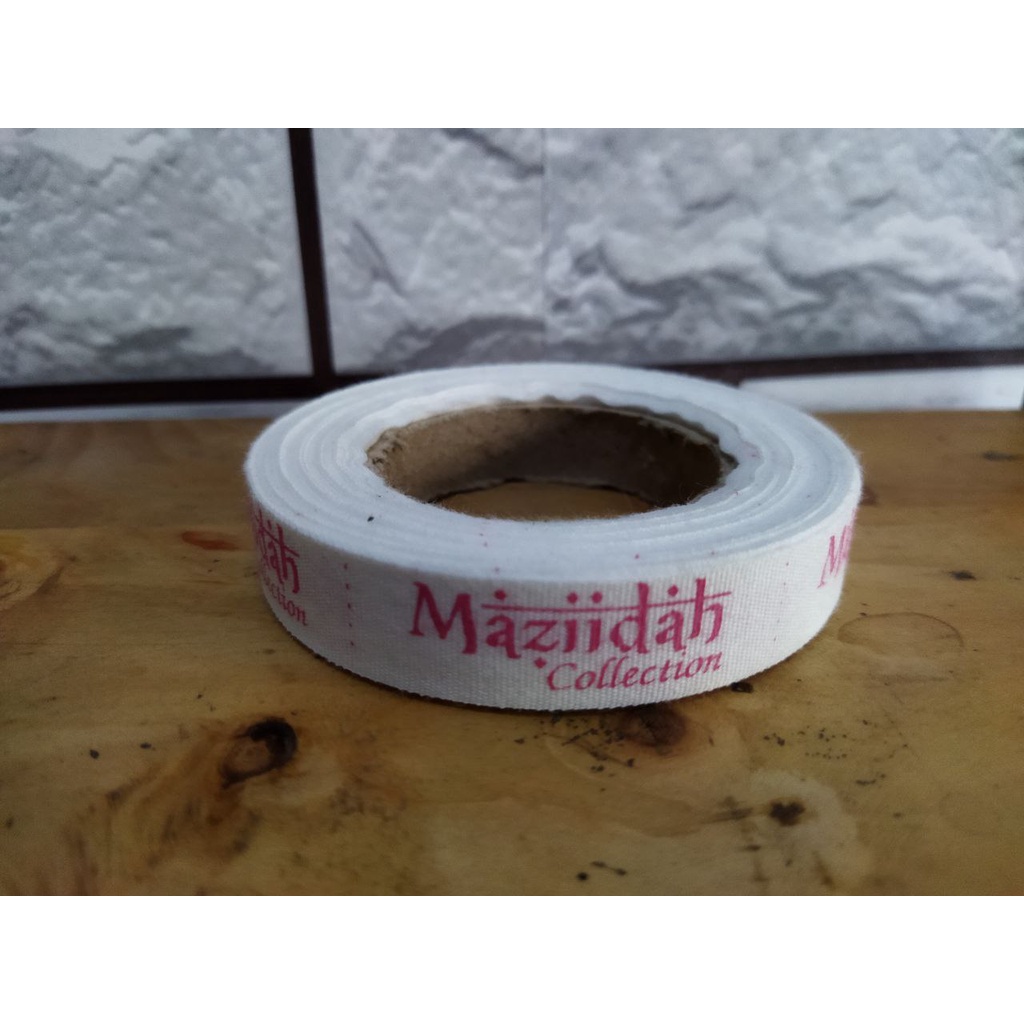 

label baju custom 2 warna ukuran 1,5 cm