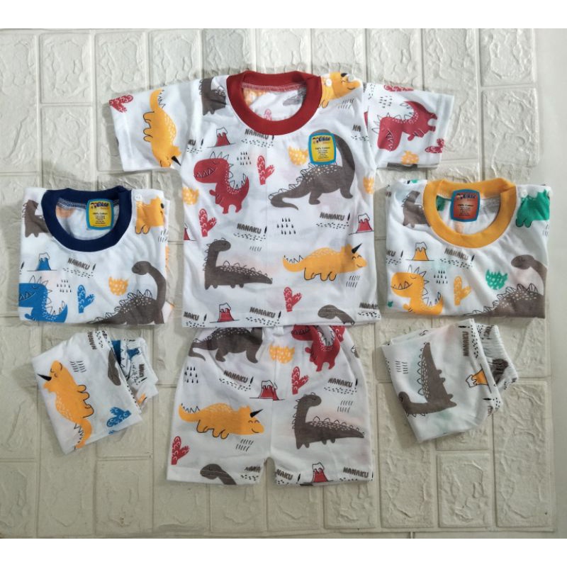 setelan pendek bayi putih motif dino