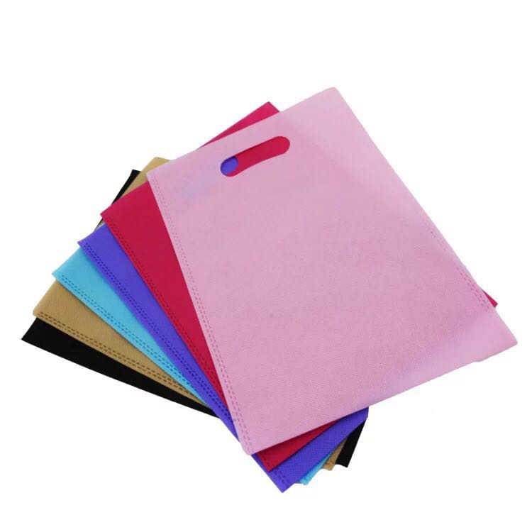 

goodie bag tas spunbond oval 25x35 TEBAL ,Tas press,dcut ,plong