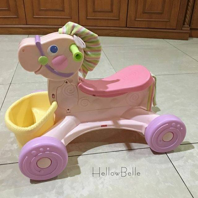 fisher price roll along musical pony