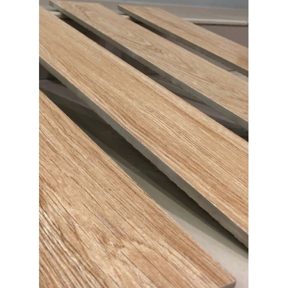 LIST PLINT GRANIT MOTIF KAYU UKURAN 10 x 60