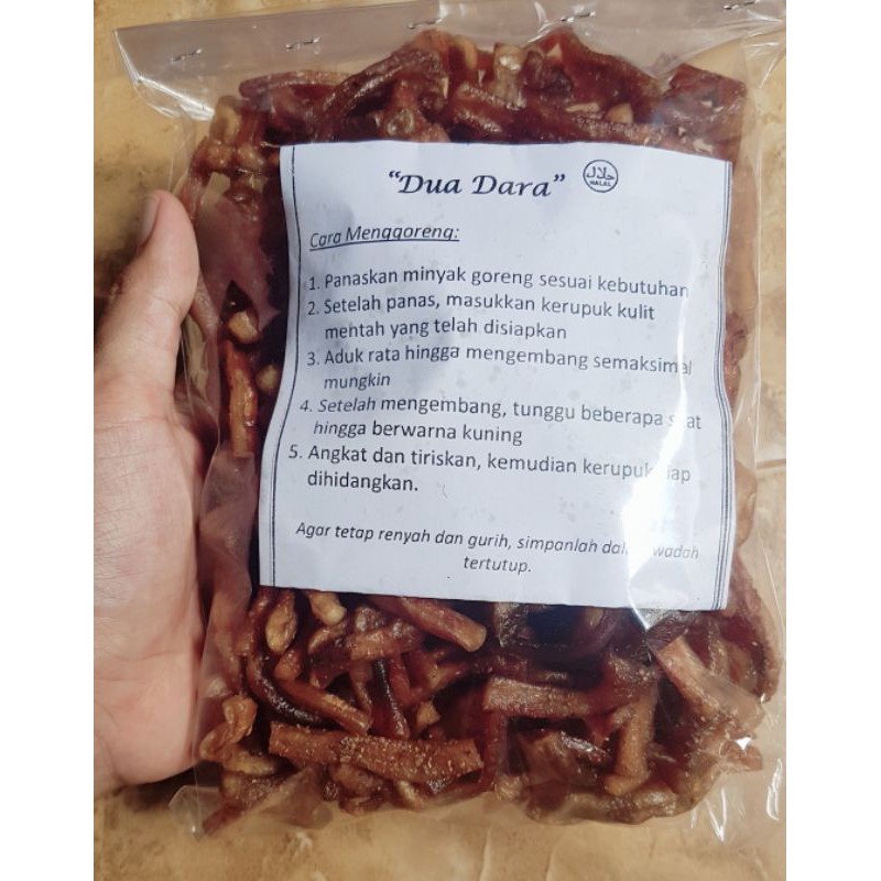 

Kerupuk Kulit Sapi Mentah Khas Lombok Cap "DUA DARA" 1/2 kg (500 gr) 100% Halal & Original