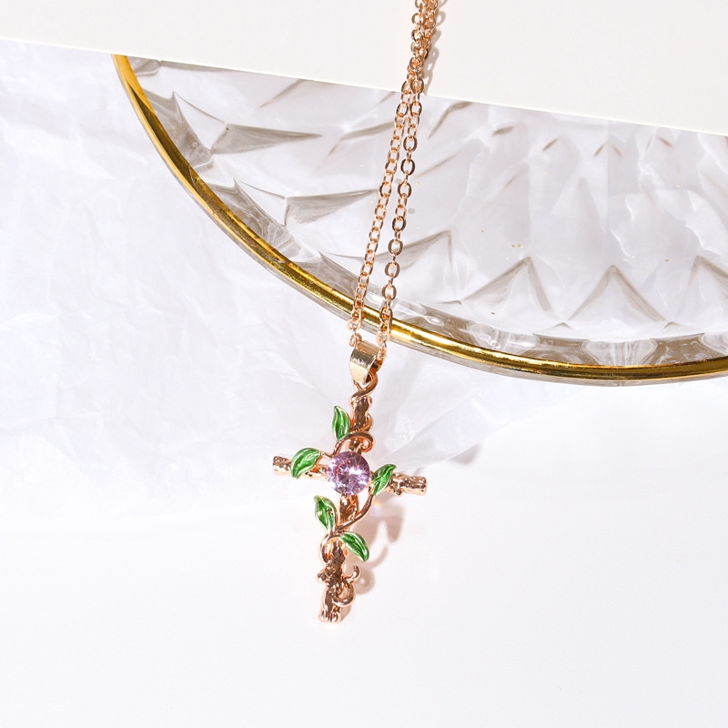 Kalung kreatif bertabur daun baru Salib berliku Kalung fashion Eropa dan Amerika