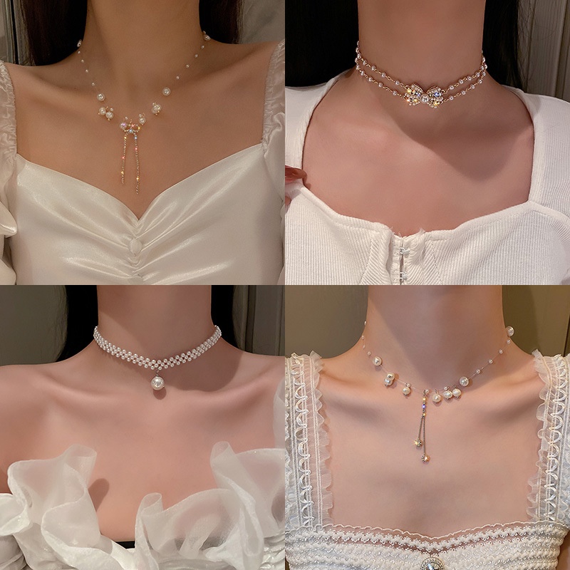 Kalung Rantai Rumbai Mutiara Berlian Desain Bunga Pita Gaya Retro Untuk Wanita