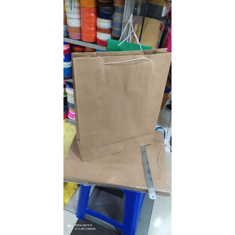 

Paper bag jumbo polos terlaris dan murah isi 12 pcs