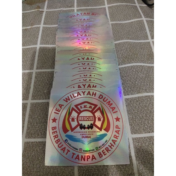 

Stiker Printing bahan Hologram + Laminasi