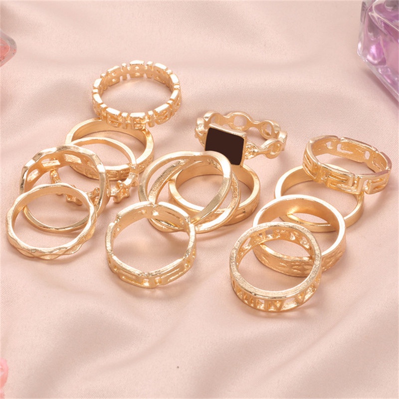 13pcs / Set Cincin Desain Bintang Warna Hitam Emas Gaya Punk Untuk Wanita