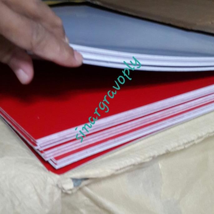 

gravoply merah teks putih bahan gravir nametag dl 60x120cm tebal 1.5ml