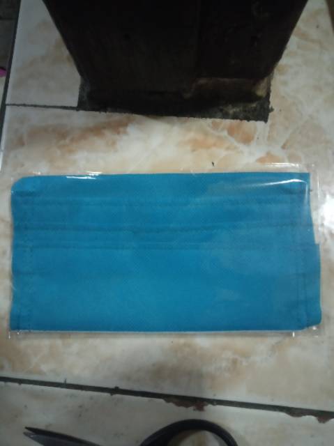 Masker kain spounbond 2 lapis mumer