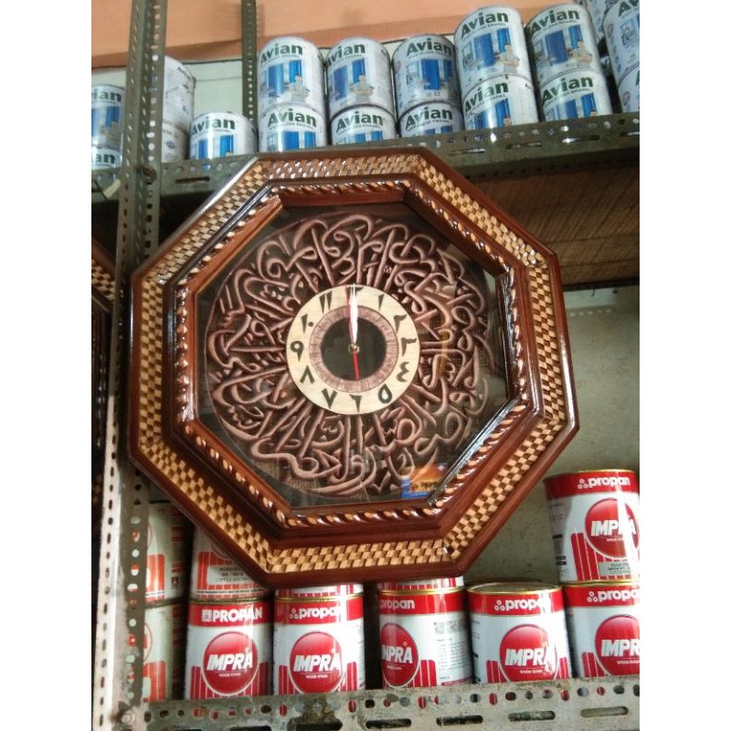 jam kaligrafi ayat kursi.