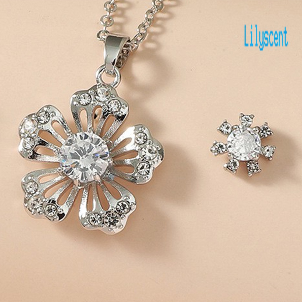1 Set Kalung Dan Anting Bentuk Kepingan Salju Model Hollow Out Bahan Cubic Zirconia Untuk Wanita