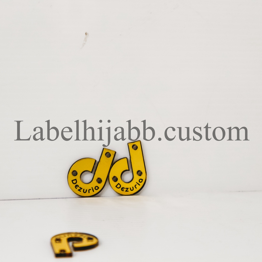 

label hijab | label baju | label akrilik | custom label | label jilbab | label cutting | label custom huruf