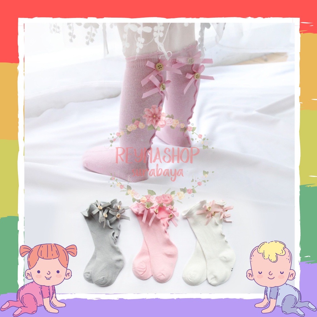 Kaos kaki panjang selutut dengan aksen Ruffle Kancing, cocok untuk anak perempuan