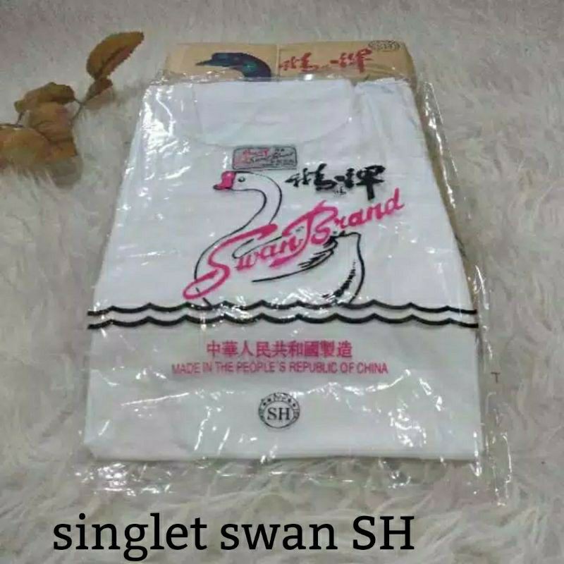 Kaos singlet  Swan  import ada tulisan SH
