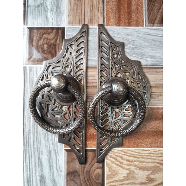 Tarikan pintu gebyok ukir kupu tarung Kuningan