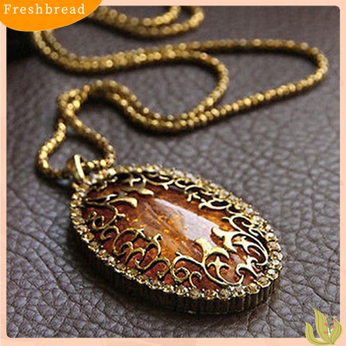 [TERLARIS]Women's Vintage Amber Tone Hollow Long Chain Drop Pendant Sweater Necklace