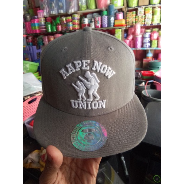 topi second AAPE
