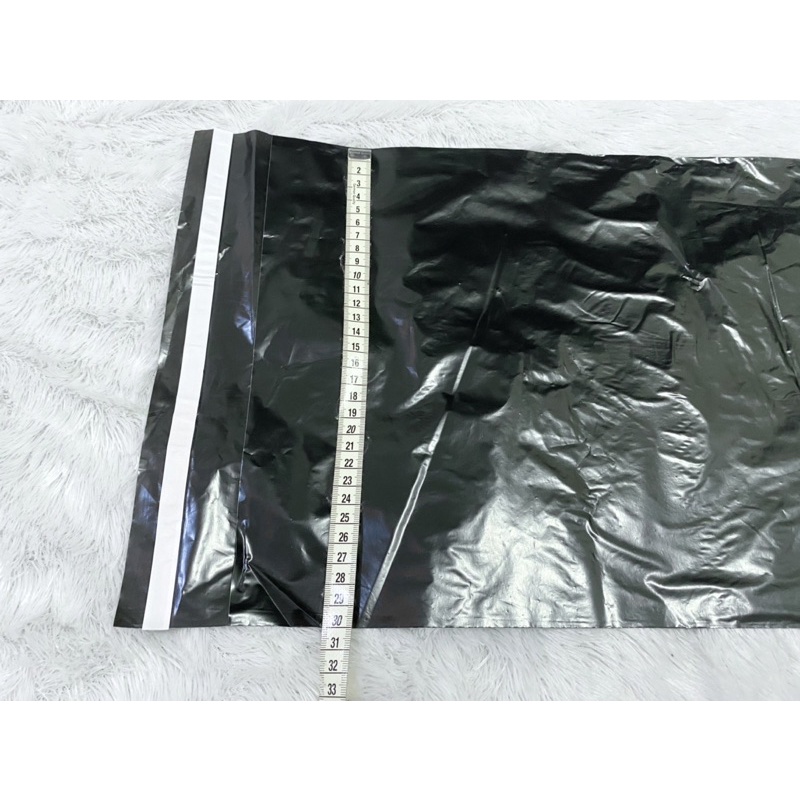 Aneka  Plastik packing polymailer PE ( glossy) - plastik online shop