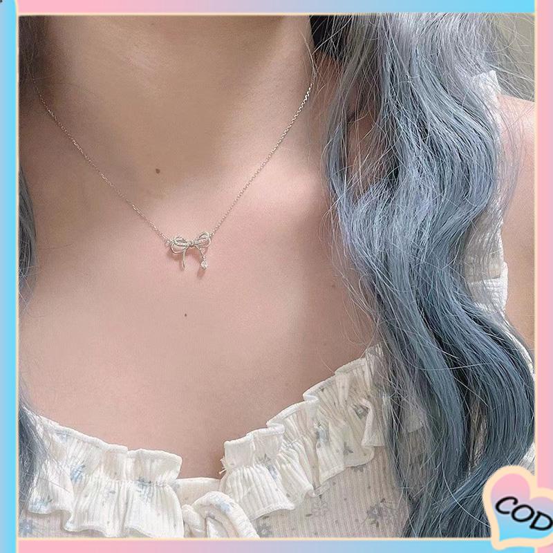 COD❤️ Tiga Dimensi Double-layer Kalung Busur Wanita Cahaya Mewah Niche Water Drop Rantai Tulang Selangka-A.one