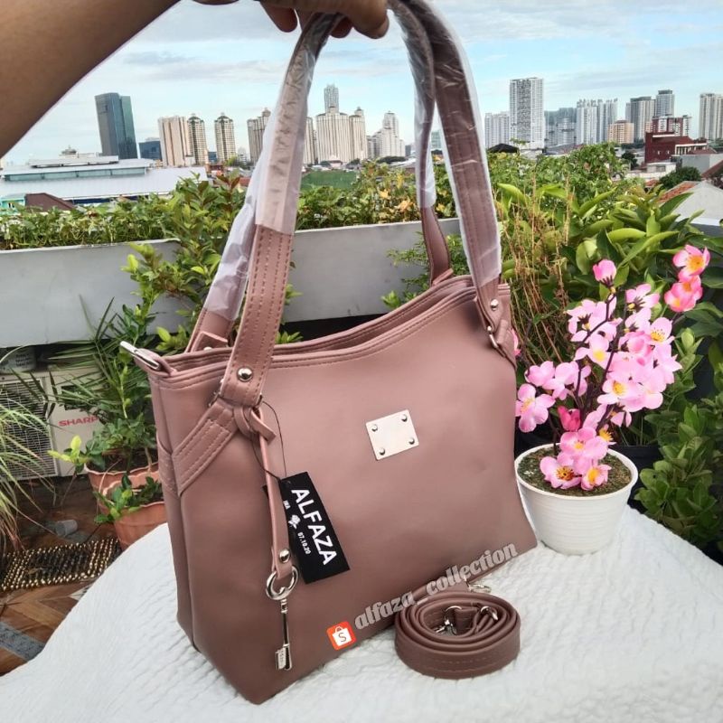 Tas wanita model plat samping unik