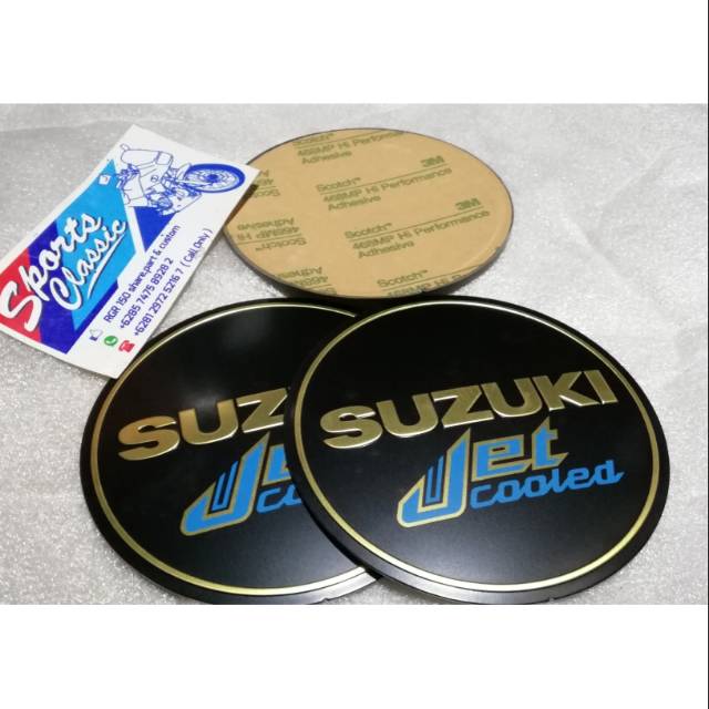 Emblem bak mesin Suzuki RC Bravo Crystal RC100 RC110 New Ori
