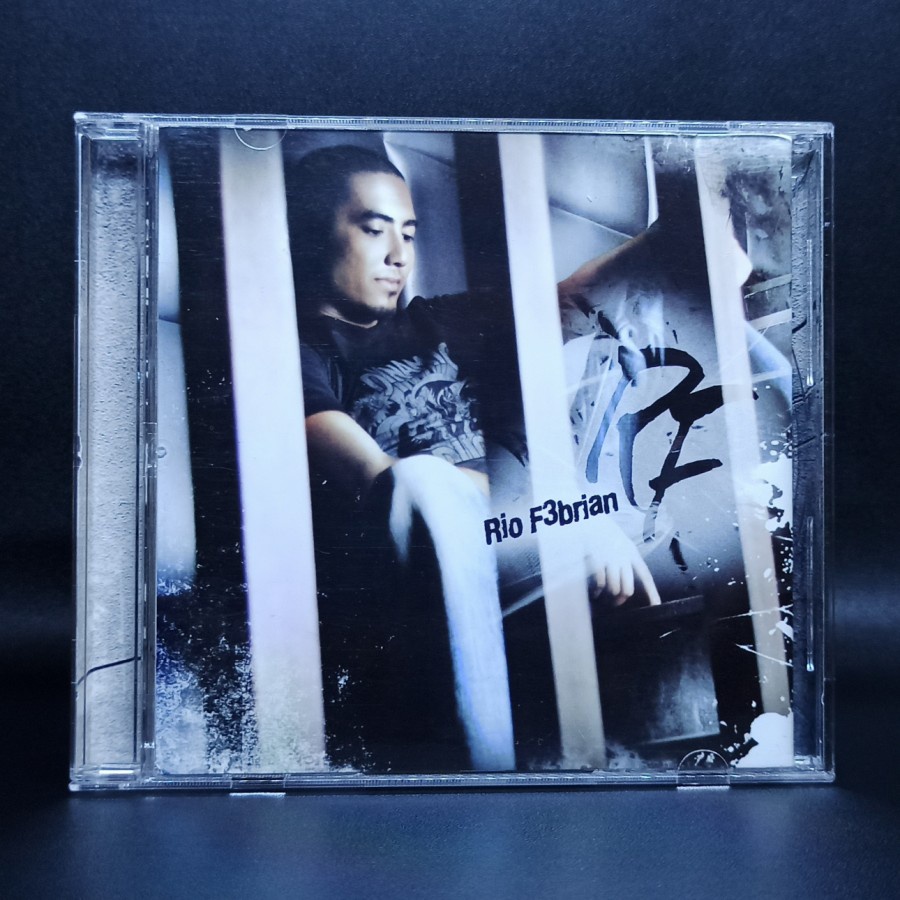 CD RIO FEBRIAN - RIO FEBRIAN & LOVE IS ORIGINAL SEGEL