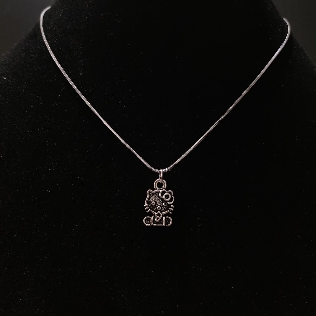 KALUNG TITANIUM HELLO KITTY LIONTIN HEART LOVE SILVER ANTI KARAT TIDAK LUNTUR TAHAN AIR WANITA PRIA / DUNIAGELANG.ID