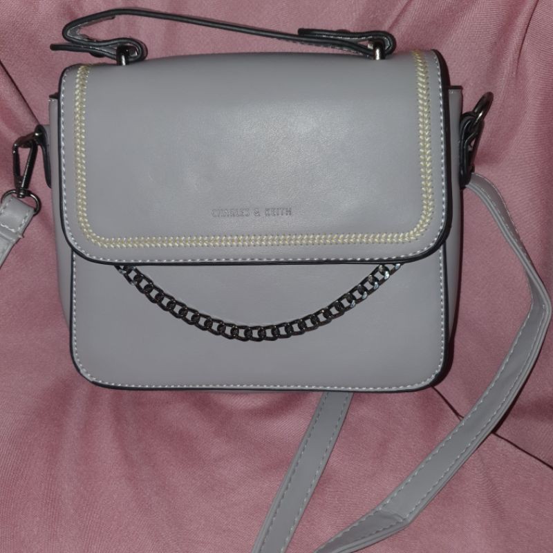 sling bag preloved Charles And Keith Abu CNK PL likenew