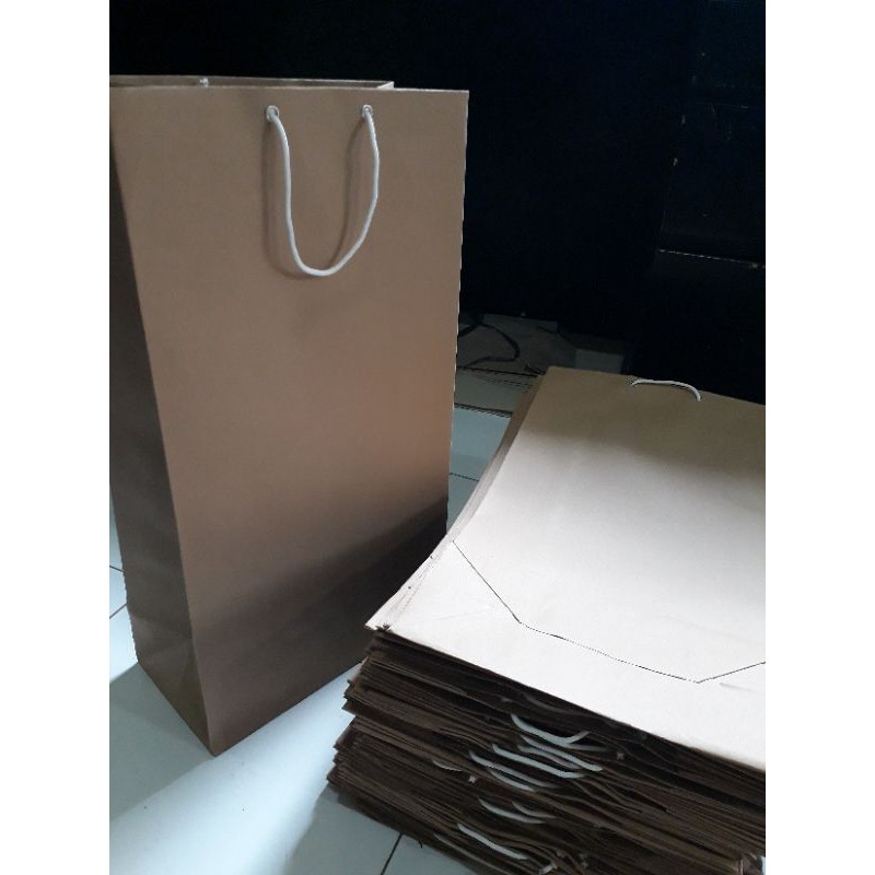 

custom paperbag potret 55cmx30cmx15