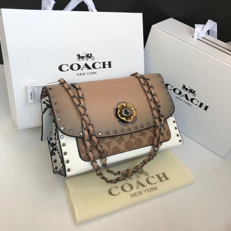 

COACH PARKER STUDDED FREE BOX MAGNET