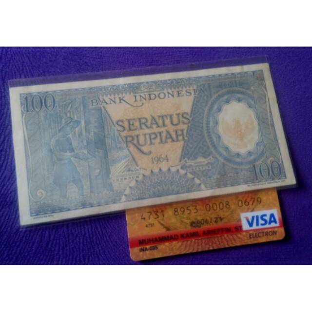 100 rupiah seri pekerja biru tahun 1964